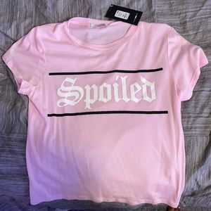 Pink “Spoiled” top from Fashion Nova.